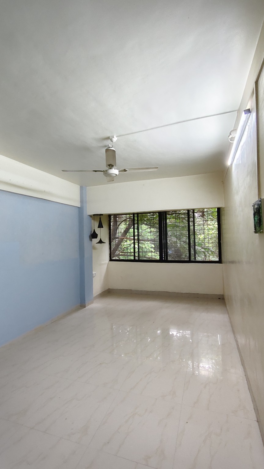 Actual living room photo of semi furnished 2 BHK flat for rent in Kothrud Pune